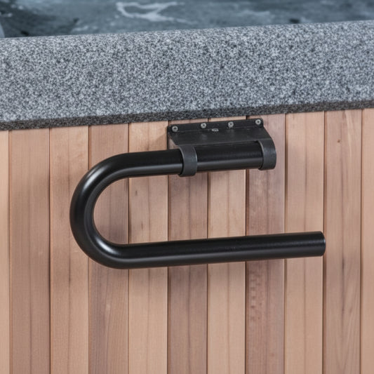 Black TowelBar mounted on a cedar hot tub cabinet just below the granite-look shell rim