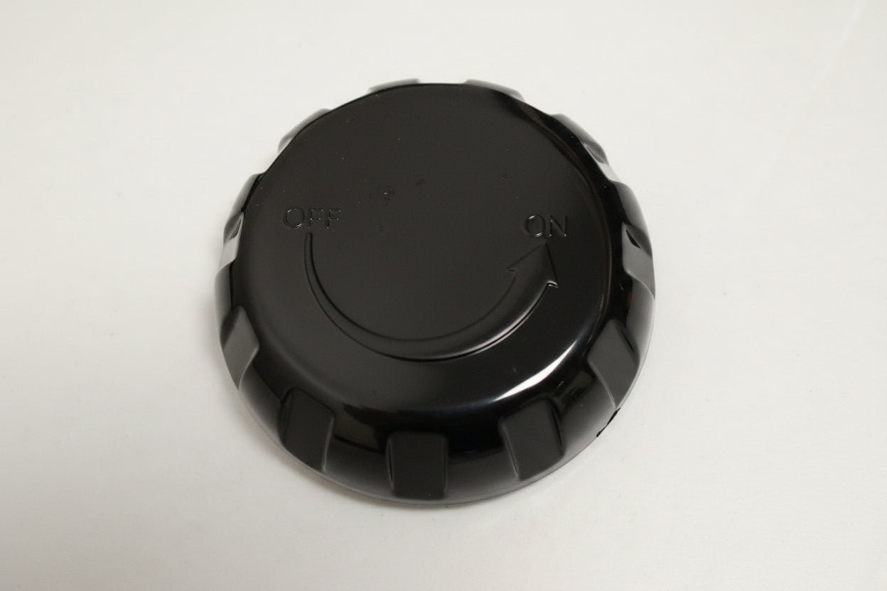 Black round air control cover cap showing OFF to ON rotation arrow, Arctic Spas hot tub part
