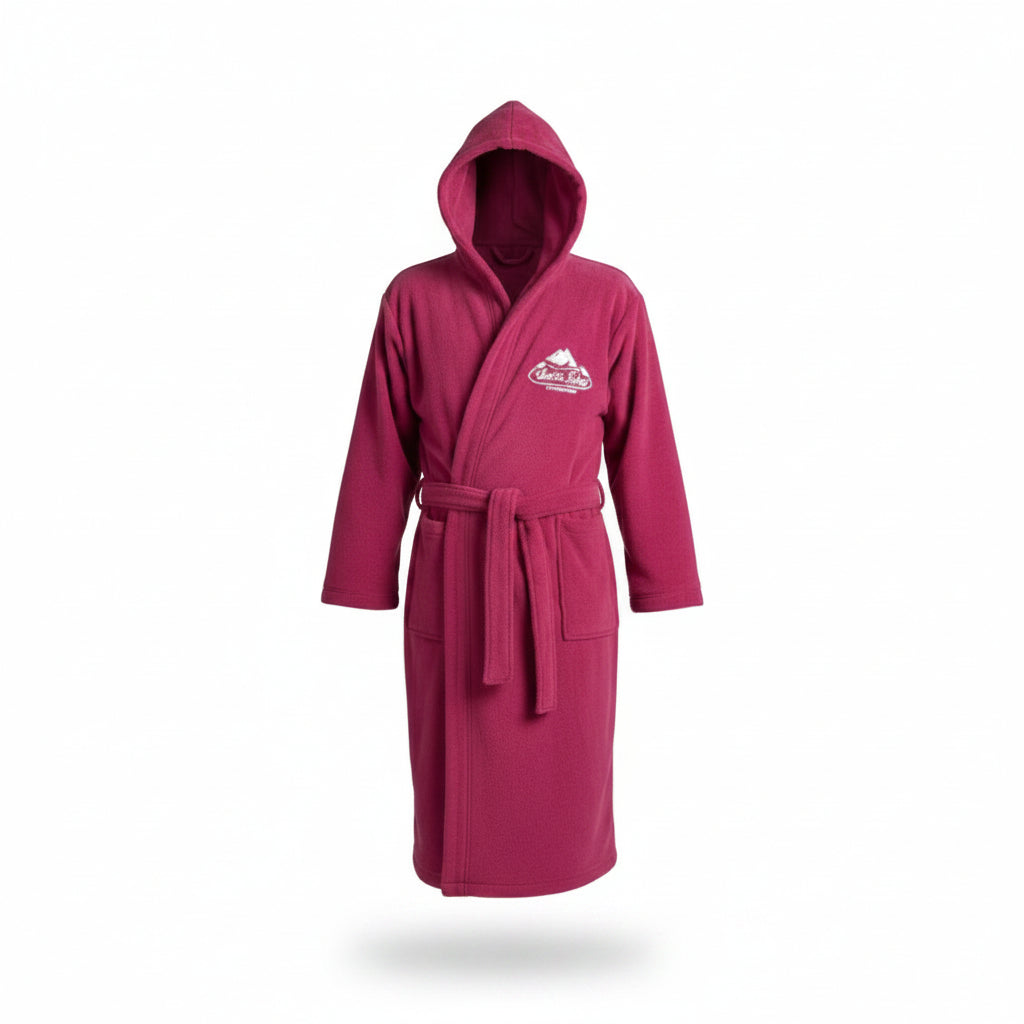 Burgundy hooded spa robe with hood up, tied belt, patch pockets and white embroidered chest crest