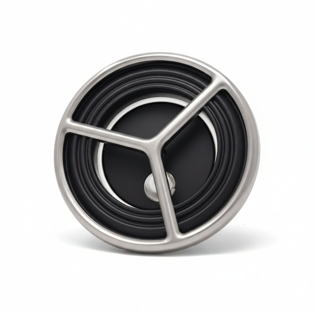 Ripple 5 inch single pulse spa jet, black face with brushed stainless tri-spoke trim ring, angled view