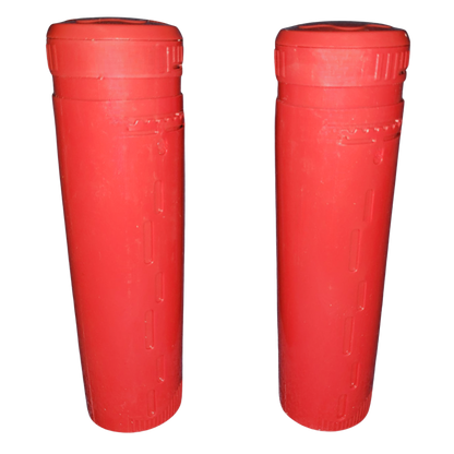 Two red Smart pH replacement cartridges for Arctic Spas Smart pH system, on black background