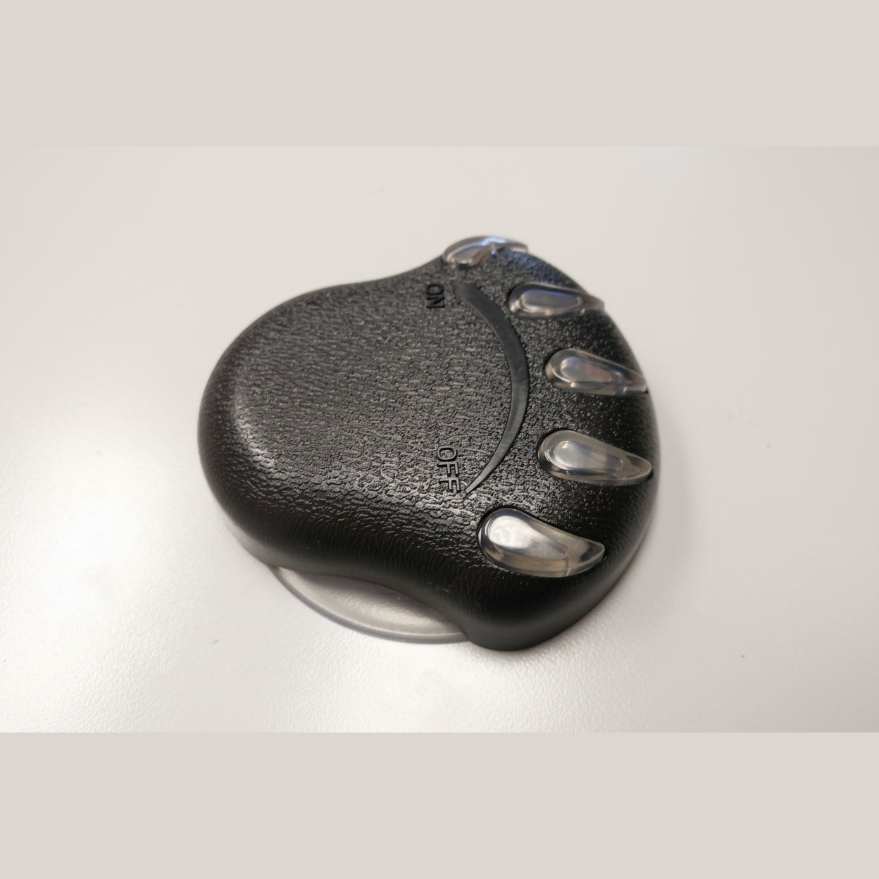 Bearclaw air control with black paw-shaped knob, clear claw tips and embossed ON and OFF markings