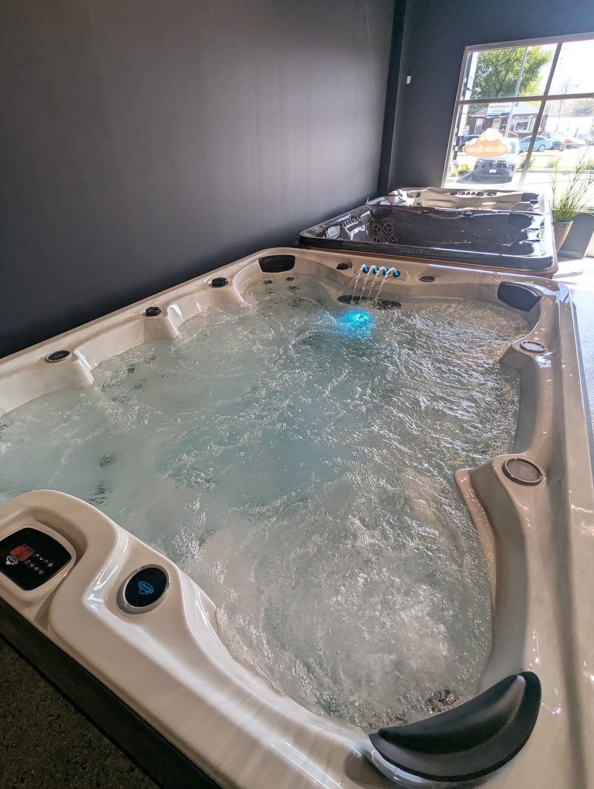 Arctic Spas All Weather Pool swim spa with the swim current running