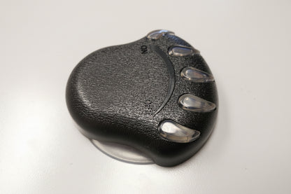 Black bear-paw style air control knob with clear claws and ON OFF arrow, shown on white surface