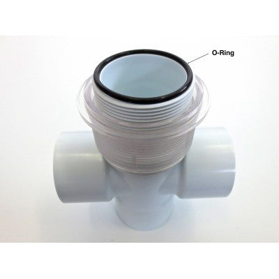 Black O-ring seated on clear diverter cap atop white valve body, labelled diagram on white background